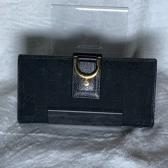 Gucci Handbags - Gucci Black Wallet with Gold Accent